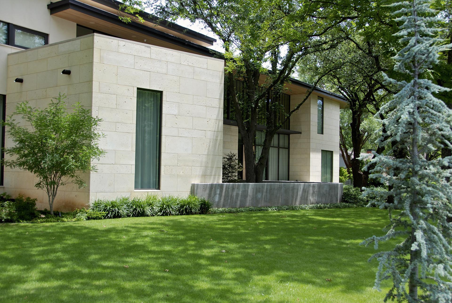Contemporary estate front yard design in Dallas by residential landscape architect