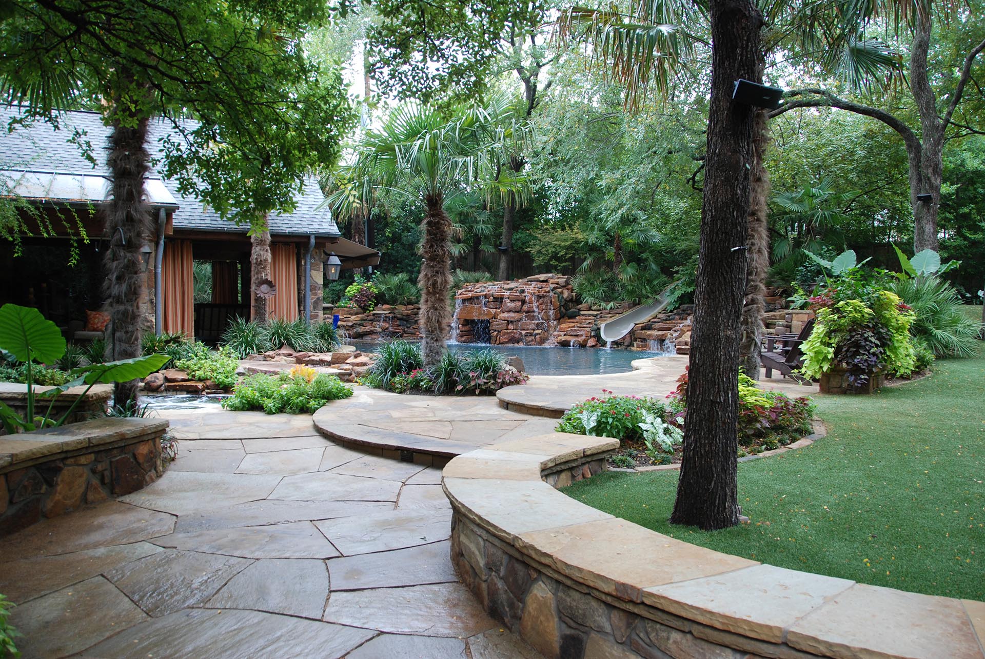 Deep shade garden retreat with flagstone pool in Dallas by landscape architect