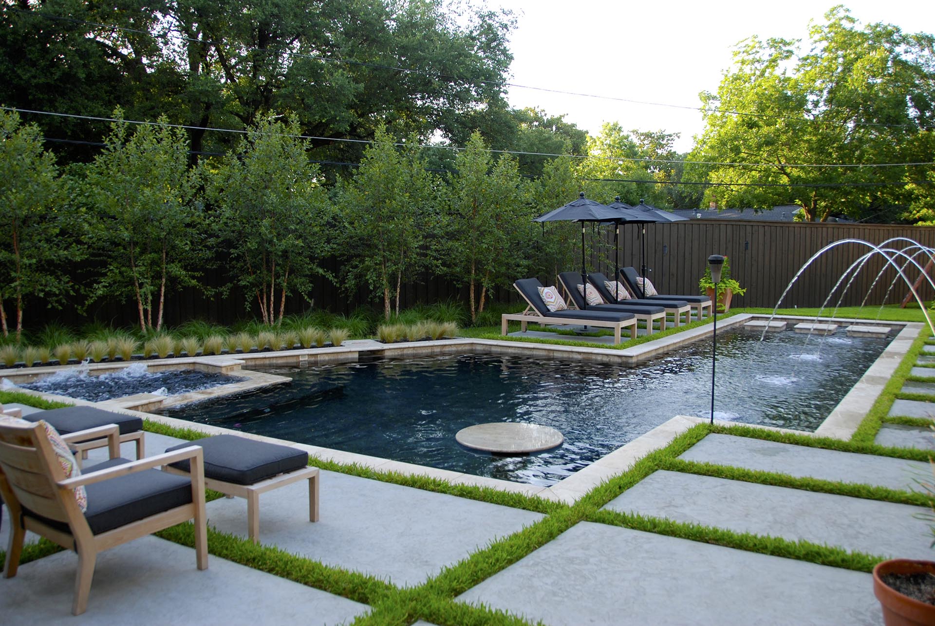 Organic modern pool landscape design in Dallas by residential landscape architect