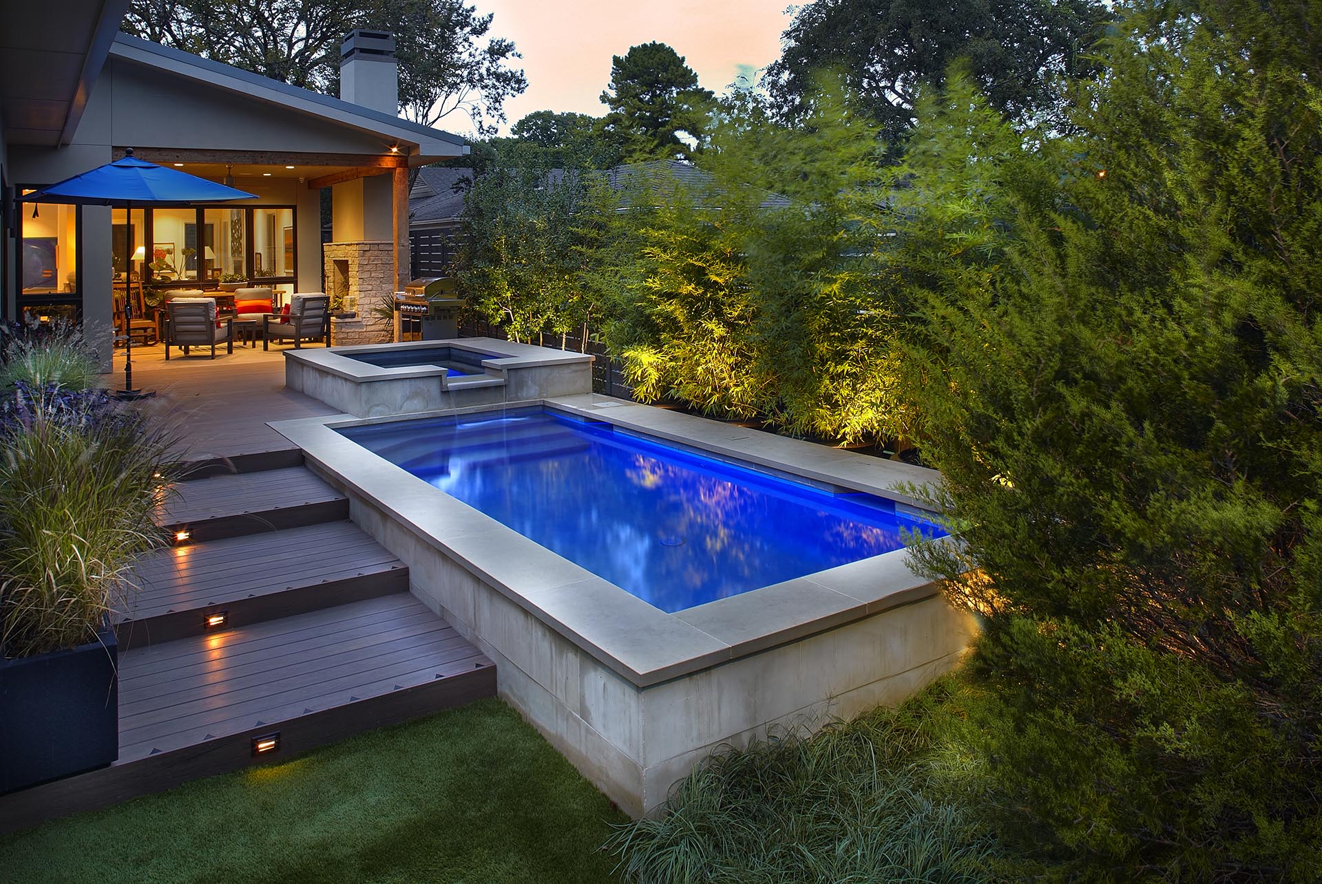 Zero lot line modern pool design for urban Dallas home by landscape architect