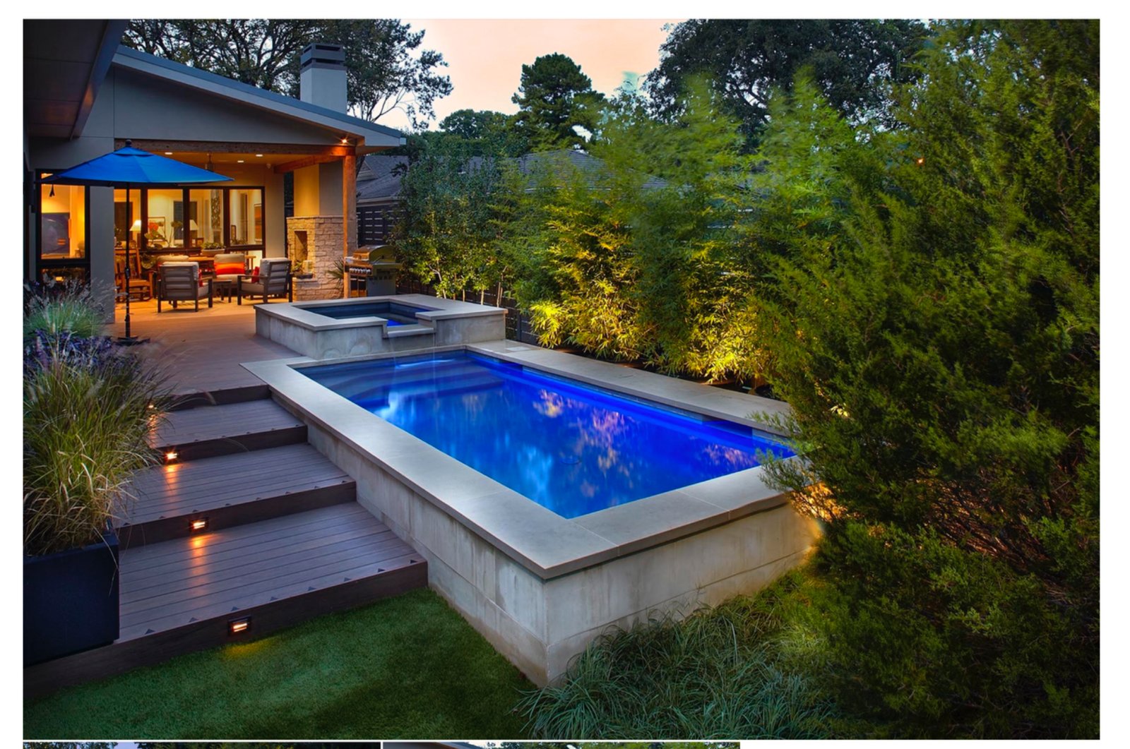 Zero Lot Line contemporary plunge pool and bamboo screen at dusk - luxury landscape design by Original Landscape Concepts in Midway Hollow, Dallas